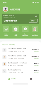 A mobile banking app screen showing account details for "Ali P.F. Njie." The user's current account balance is partially hidden. Recent activity includes money transfers, a cash power token purchase, and airtime purchase. Icons for various banking actions are displayed.